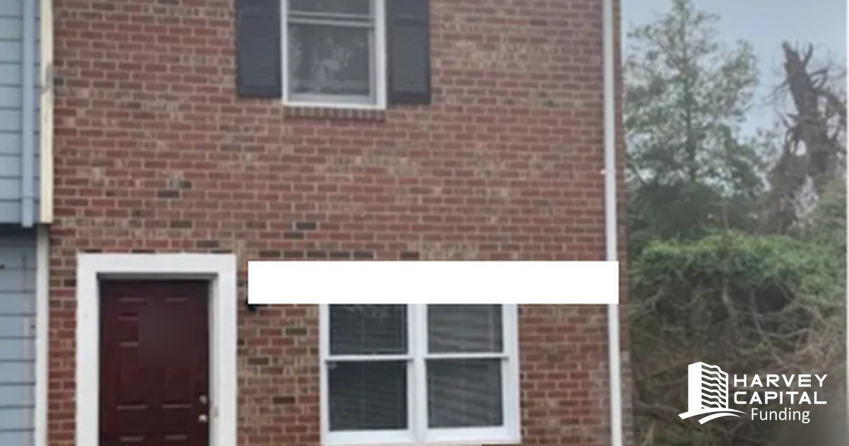Brick townhome in Greenville, North Carolina — the free-and-clear rental behind a $45,000 cash-out first lien